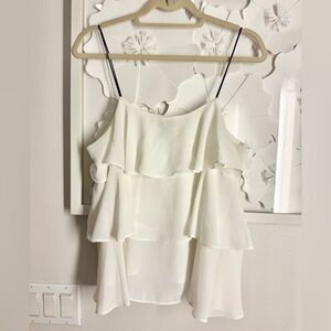 Aqua ruffle top in white. Size M